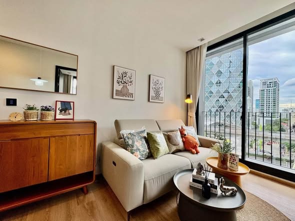 living room and bedroom of Noble Around Ari