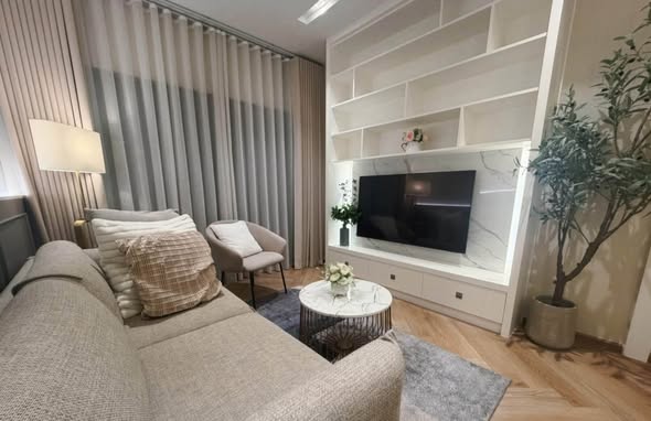 bedroom and living room of Noble Refine