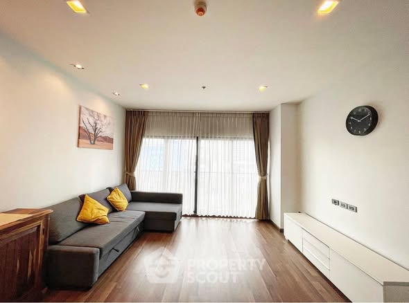 bedroom and living room of Noble Reveal