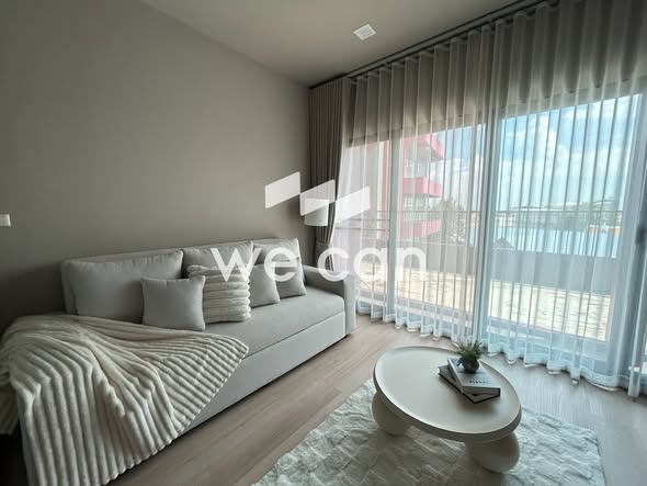 living room and bedroom of Noble Reveal