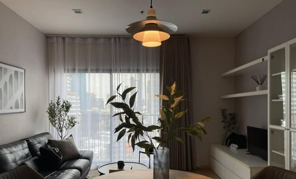 living room and bedroom of Noble Reveal