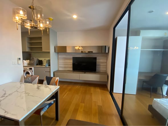 living room and room interior and kitchen of Noble Revo Silom