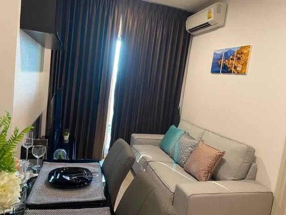 bedroom and living room of Noble Revolve Ratchada 1