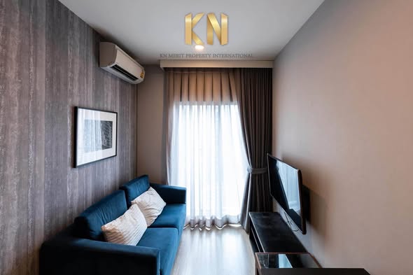 living room and bedroom of Noble Revolve Ratchada 1