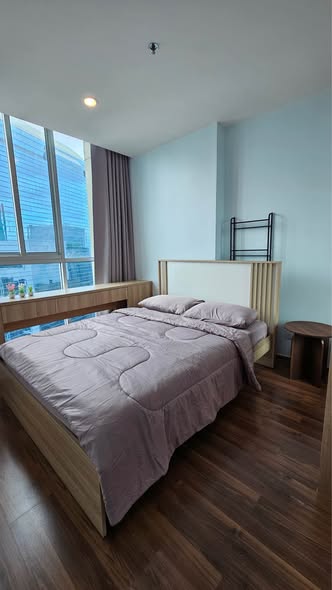 bedroom of Noble Revolve Ratchada 2