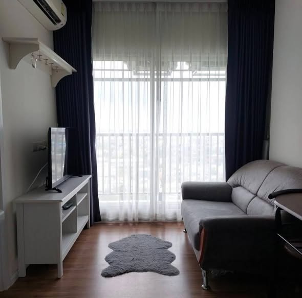 bedroom and living room of Notting Hill Sukhumvit – Phraek Sa