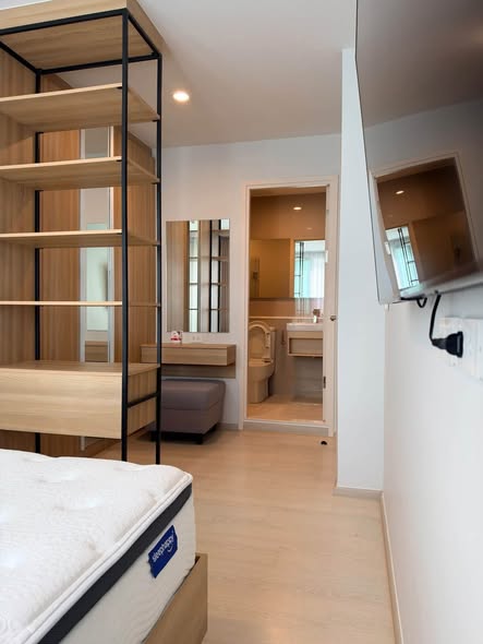 bedroom and room interior of Nue Connex Don Mueang