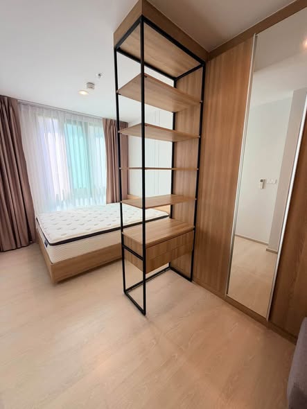 bedroom and room interior of Nue Connex Don Mueang