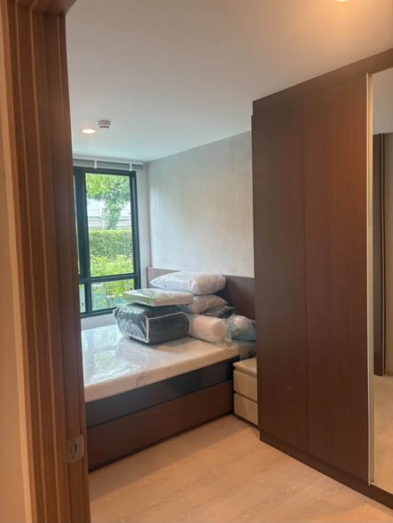 bedroom and room interior of Nue Connex Don Mueang