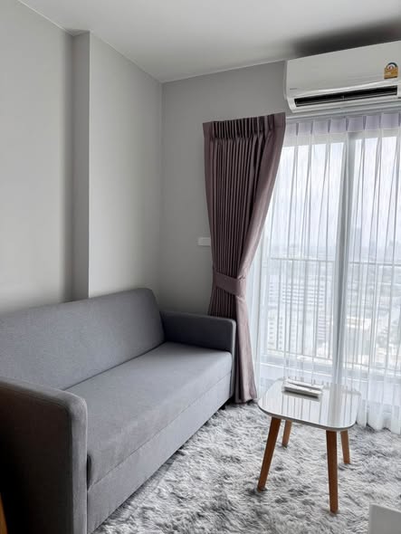 bedroom and living room of NUE Noble Srinakarin Lasalle นิว โนเบิล ศรีนครินทร์ – ลาซาล