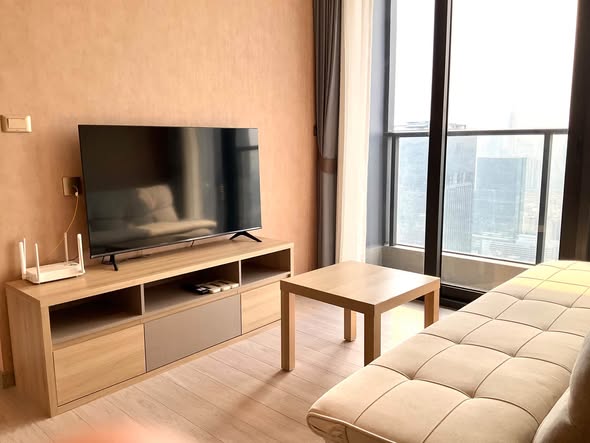 bedroom and living room of One9Five Asoke – Rama 9