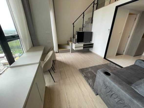living room of Origin Plug & Play Nonthaburi Station