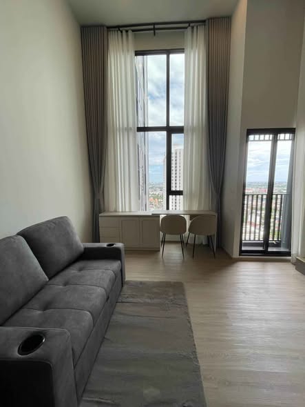 living room of Origin Plug & Play Nonthaburi Station