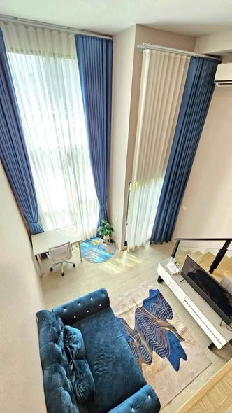 living room of Origin Plug&Play Ramkhamhaeng Triple Station