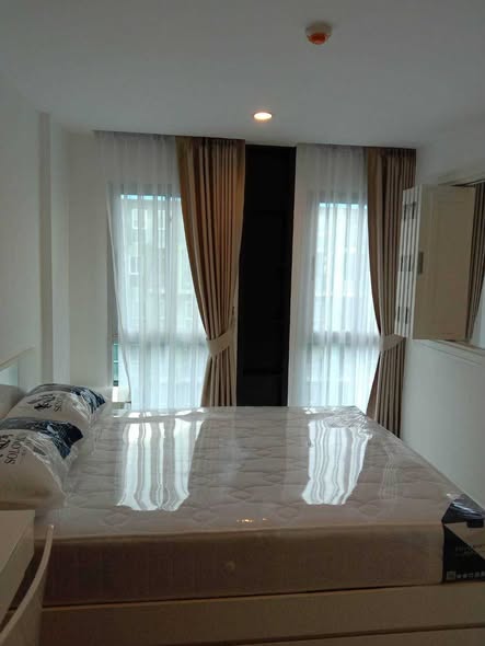bedroom and bathroom of Parc Exo Condominium |
