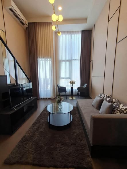 bedroom and living room of Park Origin Chula-Sam Yan