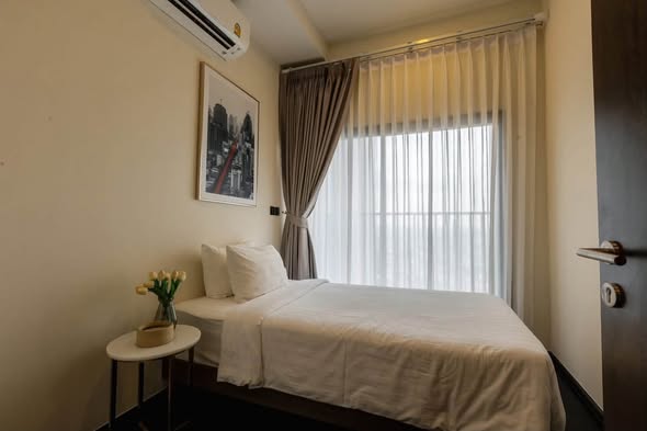 bedroom of Park​ Origin​ Thonglor