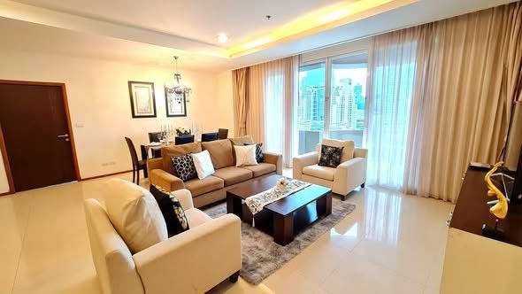 bedroom and living room of Piyathip Place Serviced Apartment