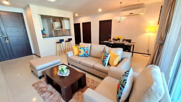 living room and bedroom of Piyathip Place Serviced Apartment