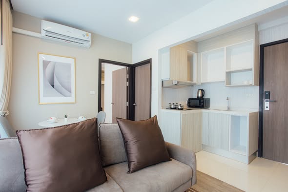 bedroom and room interior of Pleasant Condominium