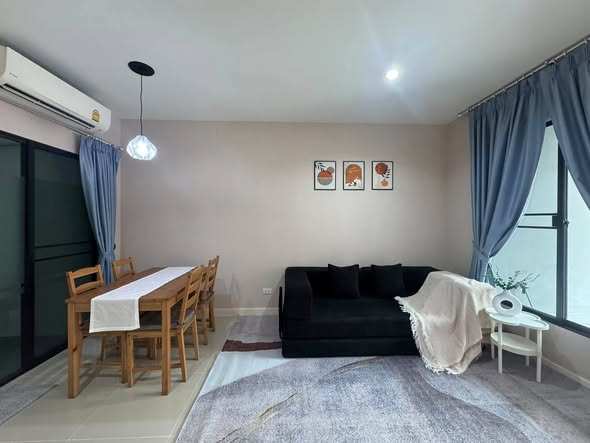 living room and bedroom of พลีโน่ สุขุมวิท-บางนา Pleno Sukhumvit-Bangna