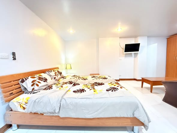 bedroom of Prime Suites Condominium