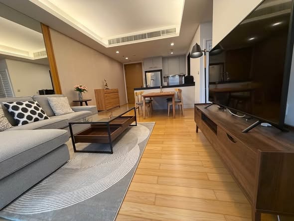 bedroom and living room of Prive by Sansiri