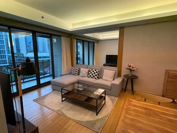 bedroom and living room of Prive by Sansiri