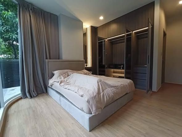 bedroom and room interior of Q Prasarnmit