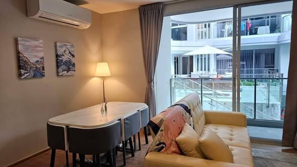 living room and bedroom of Q Prasarnmit