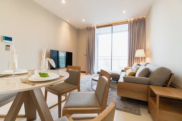 living room and bedroom of Q1 Sukhumvit Condo by Q House