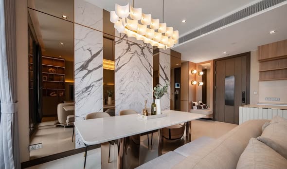 living room and kitchen of Q1 Sukhumvit Condo by Q House