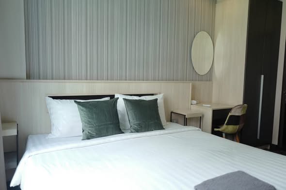 bedroom of Qube Suites Sukhumvit 46