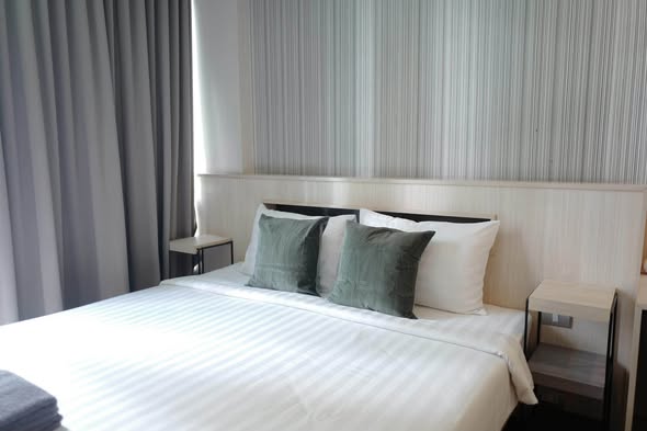 bedroom of Qube Suites Sukhumvit 46