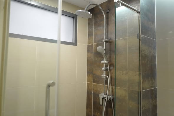 room interior and bathroom of Qube Suites Sukhumvit 46
