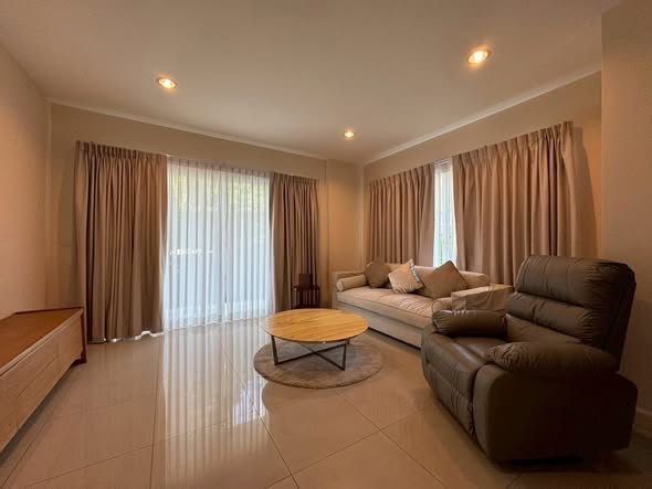 living room and bedroom of Residence 52 Condominium
