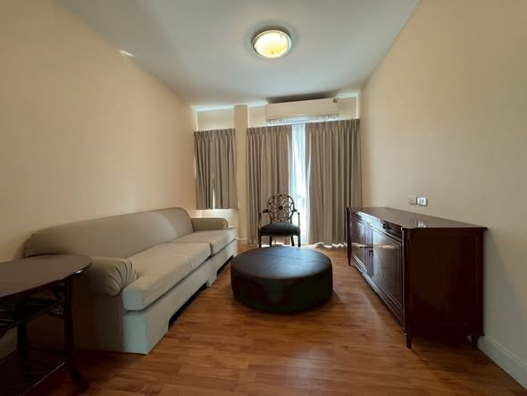 living room and bedroom of Residence 52 Condominium