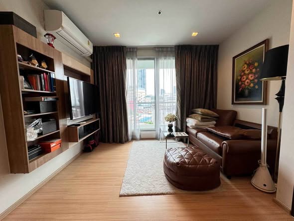 bedroom and living room of RHYTHM Sathorn