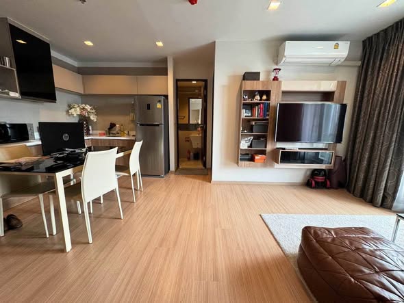 bedroom and living room of RHYTHM Sathorn