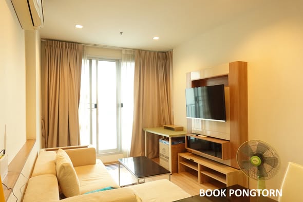 bedroom and living room of RHYTHM Sathorn