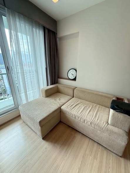 bedroom and living room of RHYTHM Sathorn