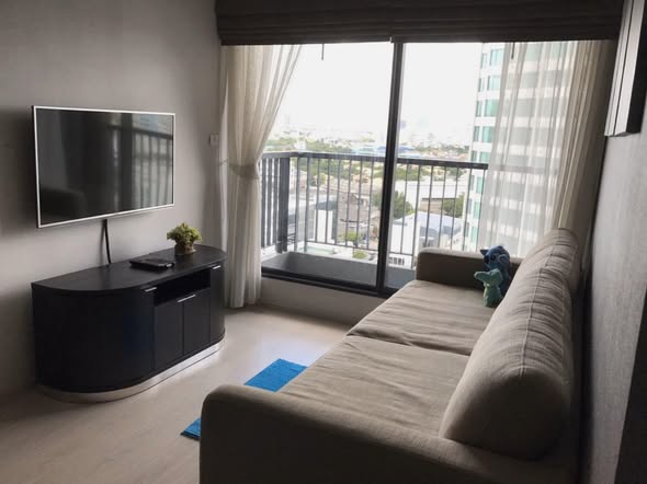 bedroom and living room of RHYTHM Sukhumvit 44/1