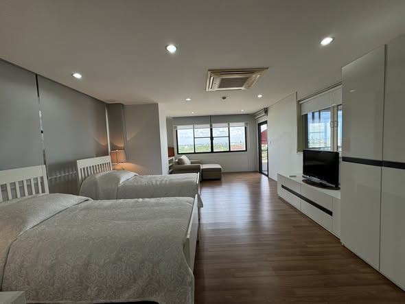 bedroom of Riverine Place Hotel and Residence