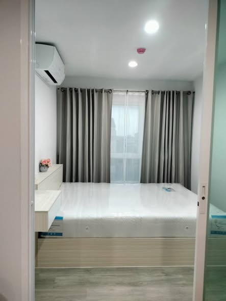 bedroom and room interior of RYE Talat Phlu