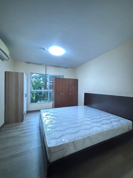 bedroom of S&S Sukhumvit Condominium