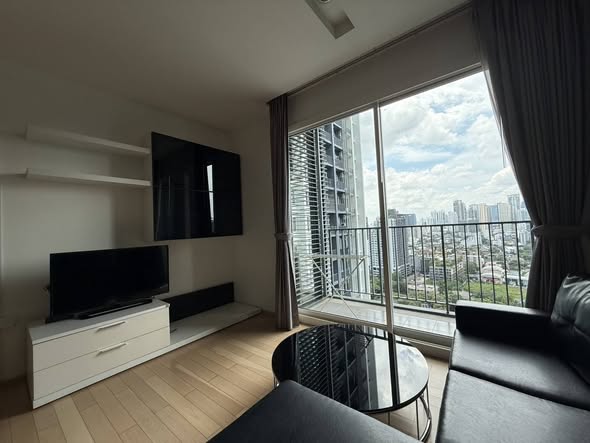 bedroom and living room of Siri at Sukhumvit