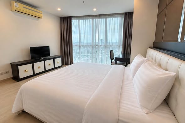 bedroom of Sky Walk Residences