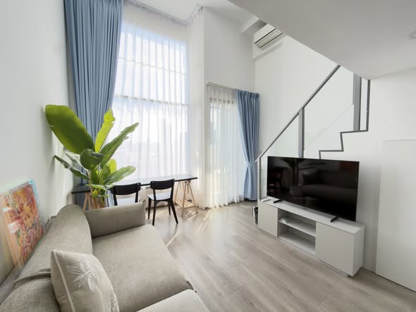living room and bedroom of SOHO​ BANGKOK​ RATCHADA​