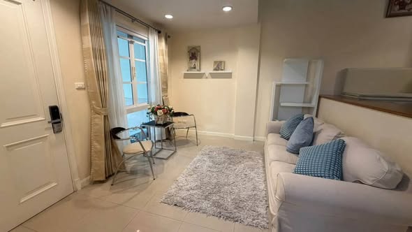 bedroom and living room of Soi Mu Ban Plus City Park Sukhumvit 101/1