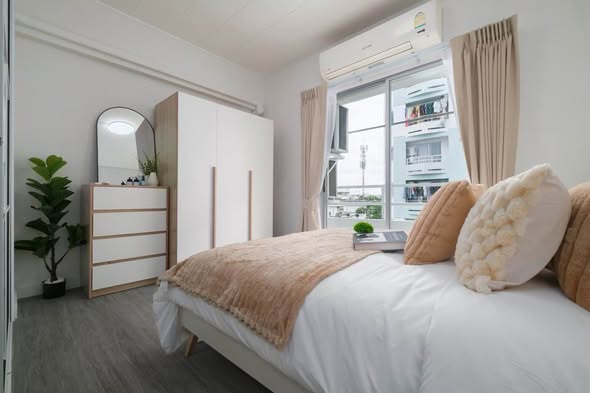 bedroom of Studio One Condo